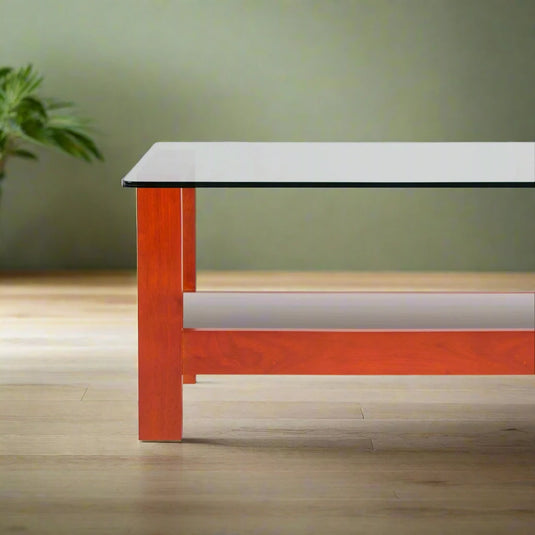 decra coffee table and a plant getting sunlight from window